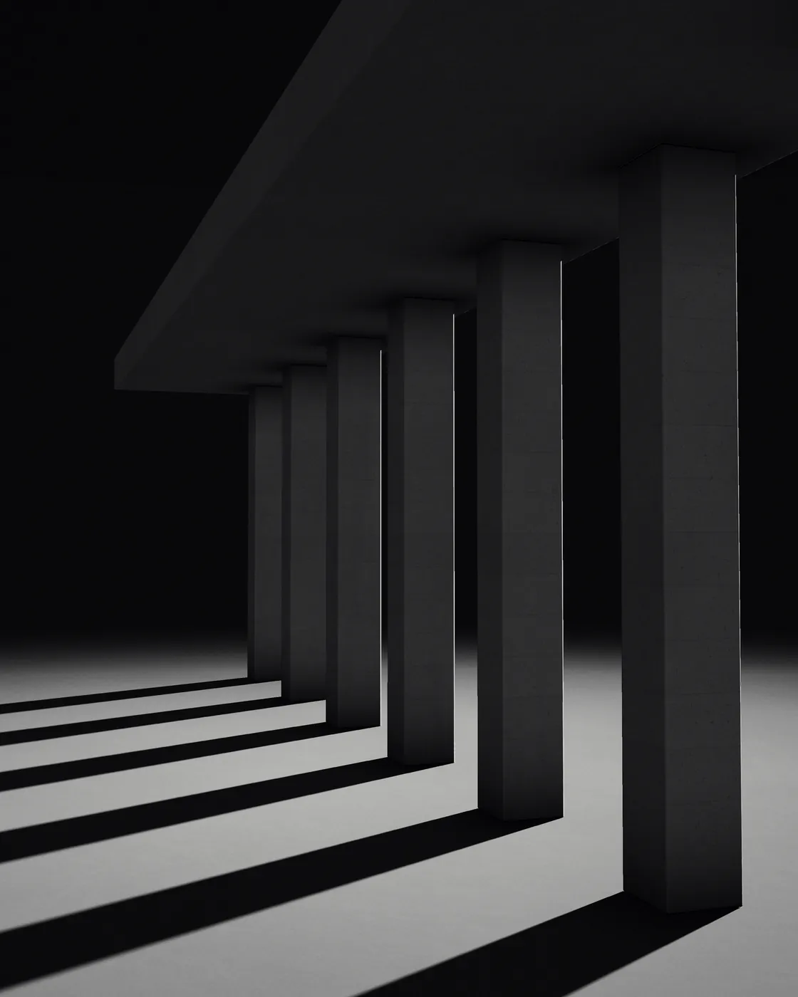 A row of square concrete pillars under a flat roof, in the dark